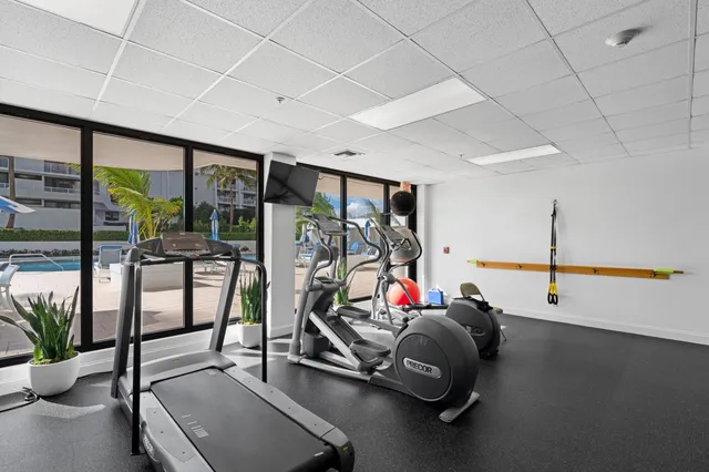 a kitchen with lots of counter top space and living room