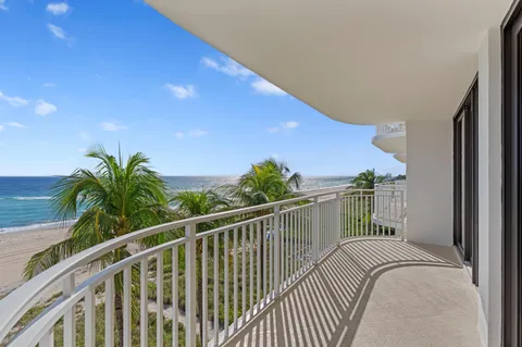 a view of balcony with furniture