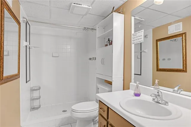 a kitchen with a stove top oven and cabinets