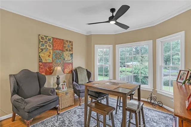 a work room with furniture and windows