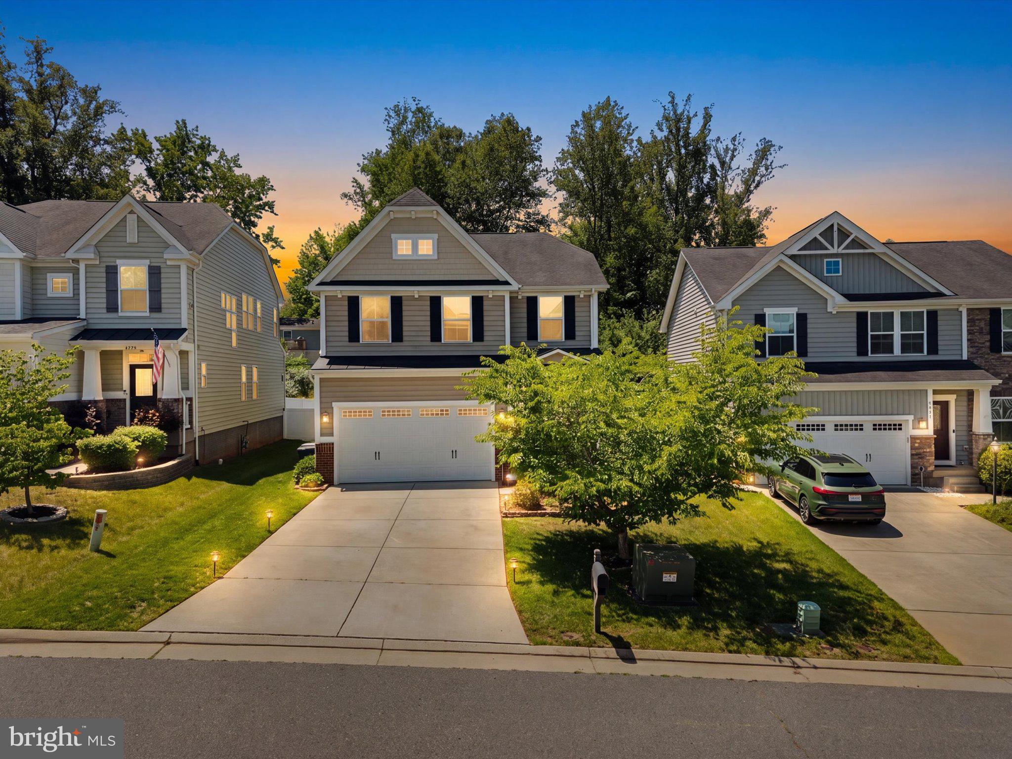 2381 Jersey Pine Ridge Charlottesville, VA 22911 - Photo 1 of 72 Charming homes at dusk, inviting warmth.