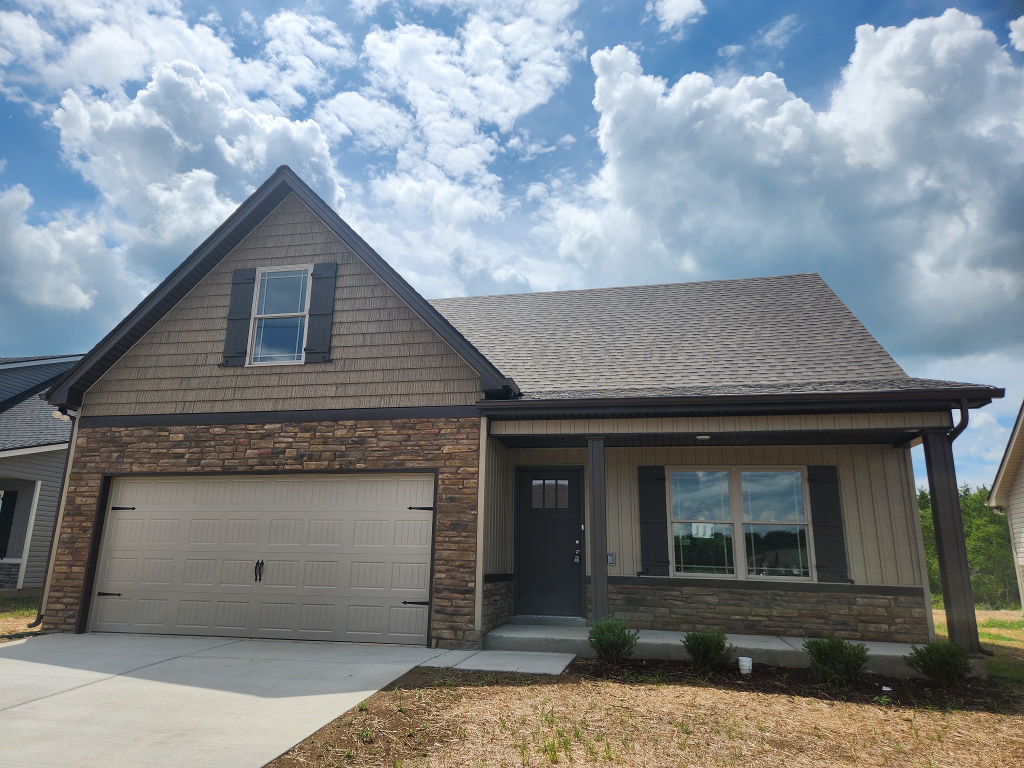 2113 Red Barn Road Christiana, TN 37037 - Photo 1 of 94 a front view of a house with garage