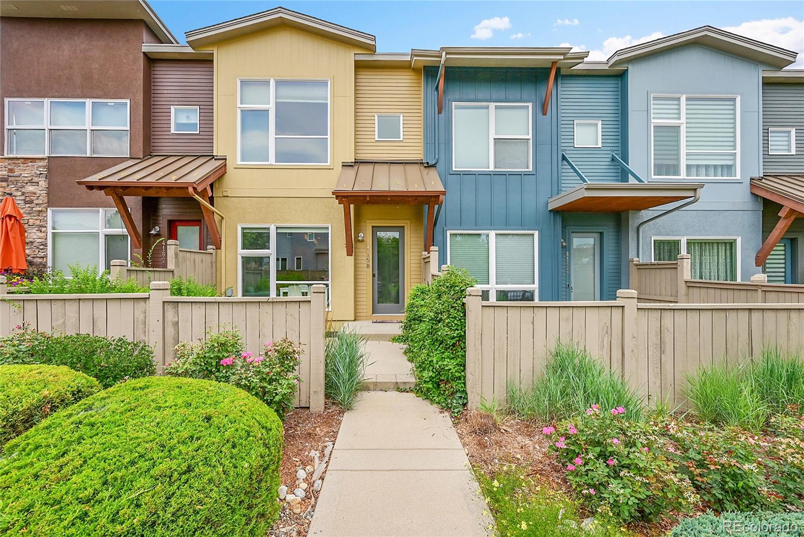 4158 Longview Lane Boulder, CO 80301 - Photo 1 of 15 a front view of a house with a yard