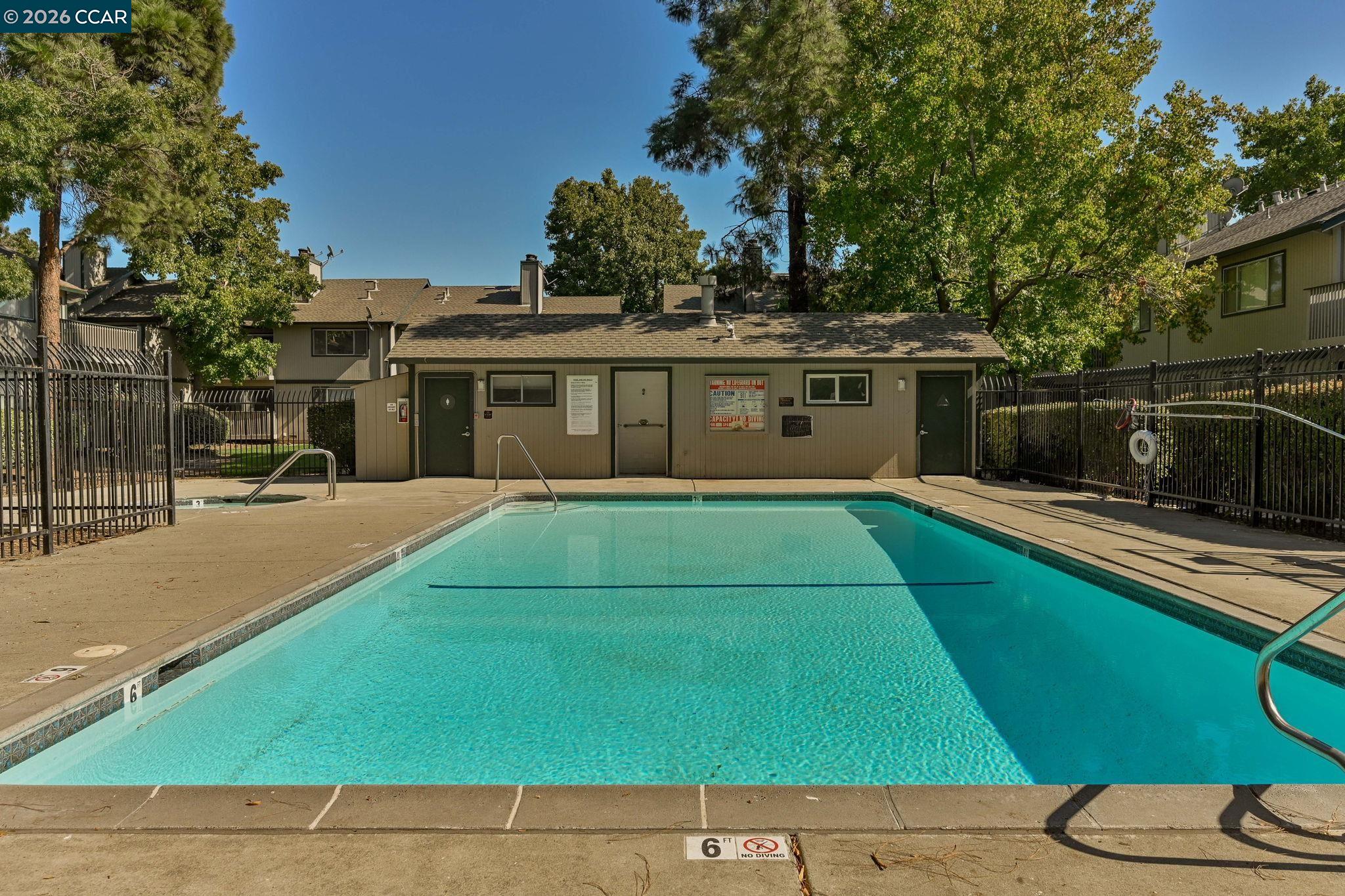 641 Chadwick Lane Bay Point, CA 94565 - Photo 18 of 20 a view of a house with a swimming pool