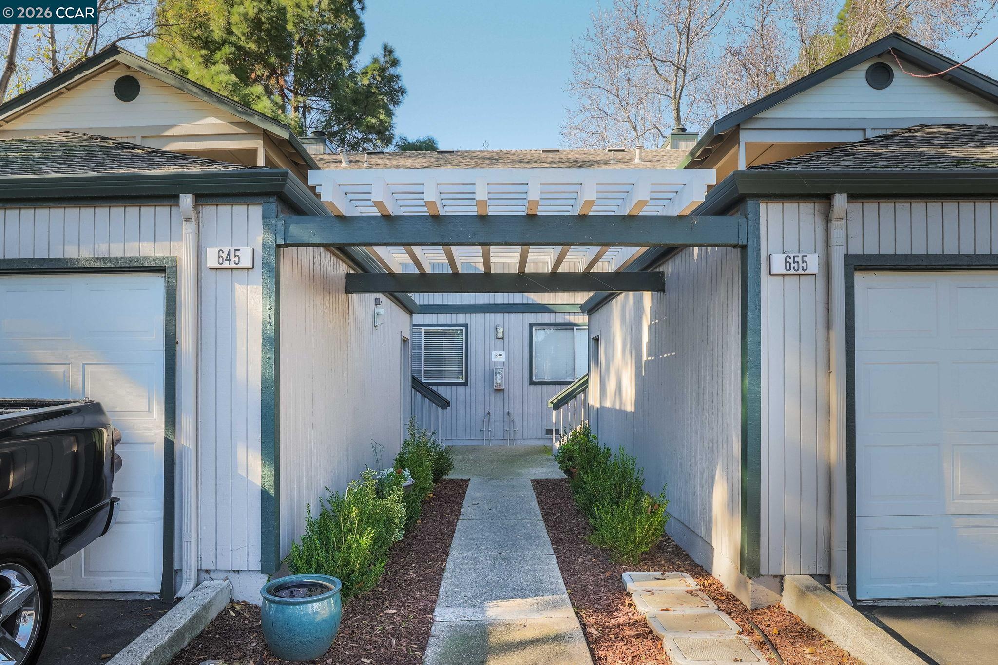 641 Chadwick Lane Bay Point, CA 94565 - Photo 2 of 20 a view of a house with a small yard and wooden floor