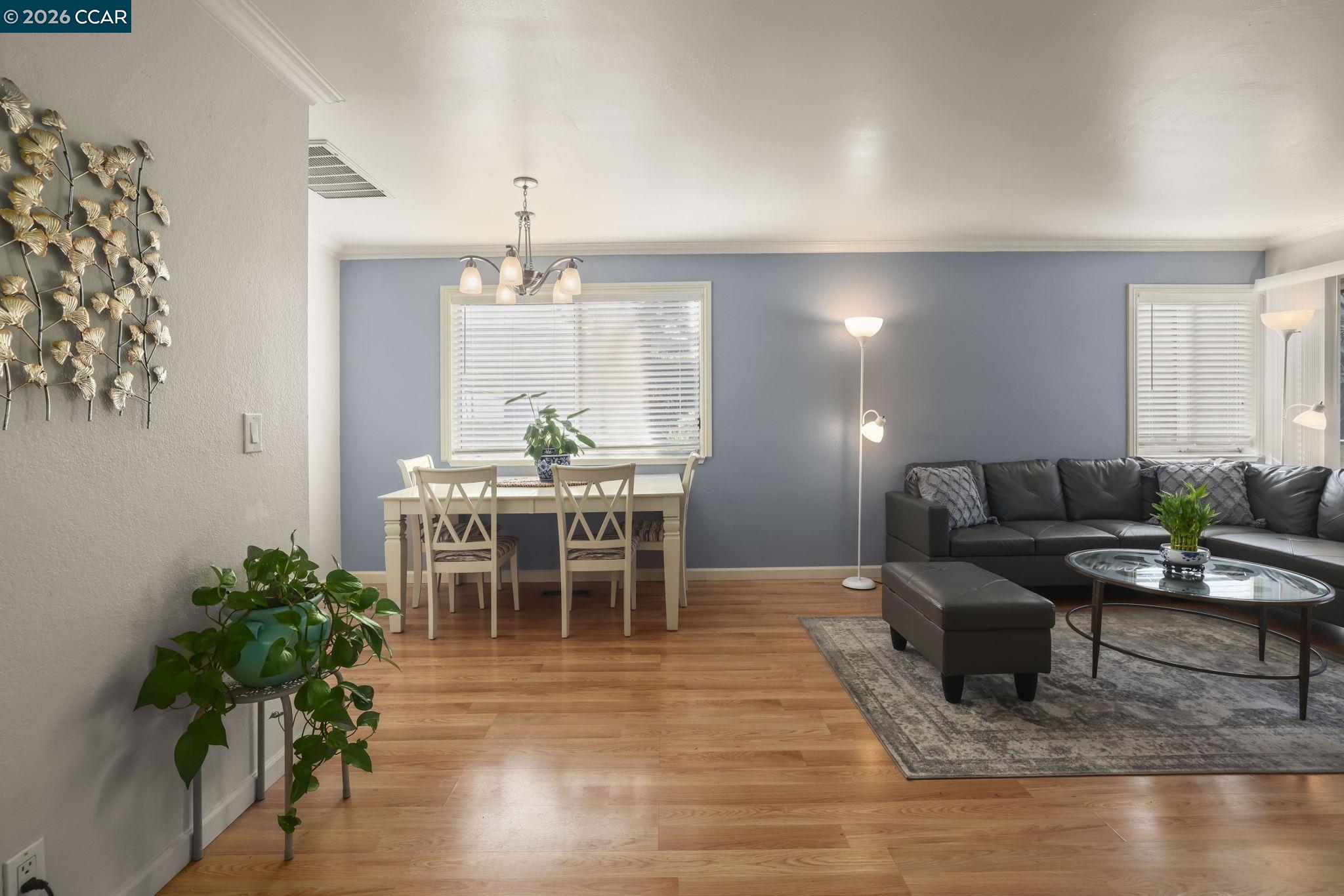 641 Chadwick Lane Bay Point, CA 94565 - Photo 4 of 20 a living room with furniture and a wooden floor