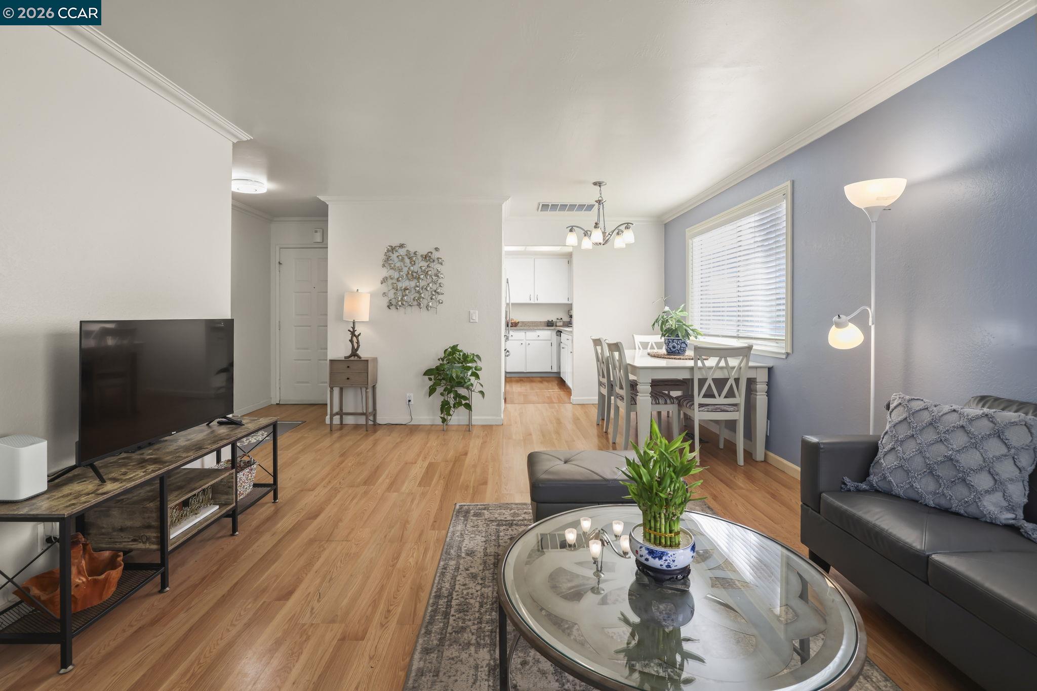 641 Chadwick Lane Bay Point, CA 94565 - Photo 5 of 20 a living room with furniture and a flat screen tv