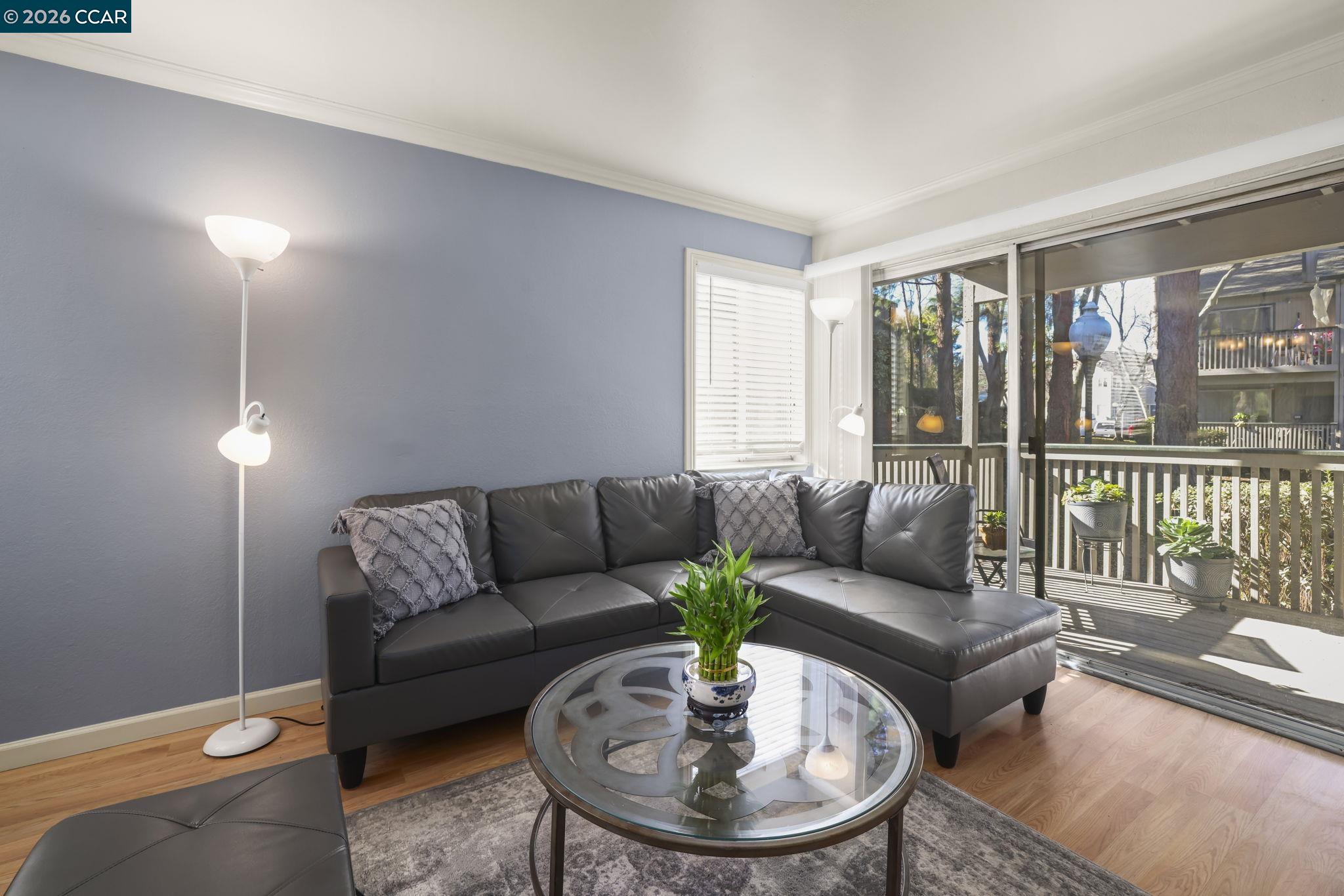 641 Chadwick Lane Bay Point, CA 94565 - Photo 6 of 20 a living room with furniture and a table