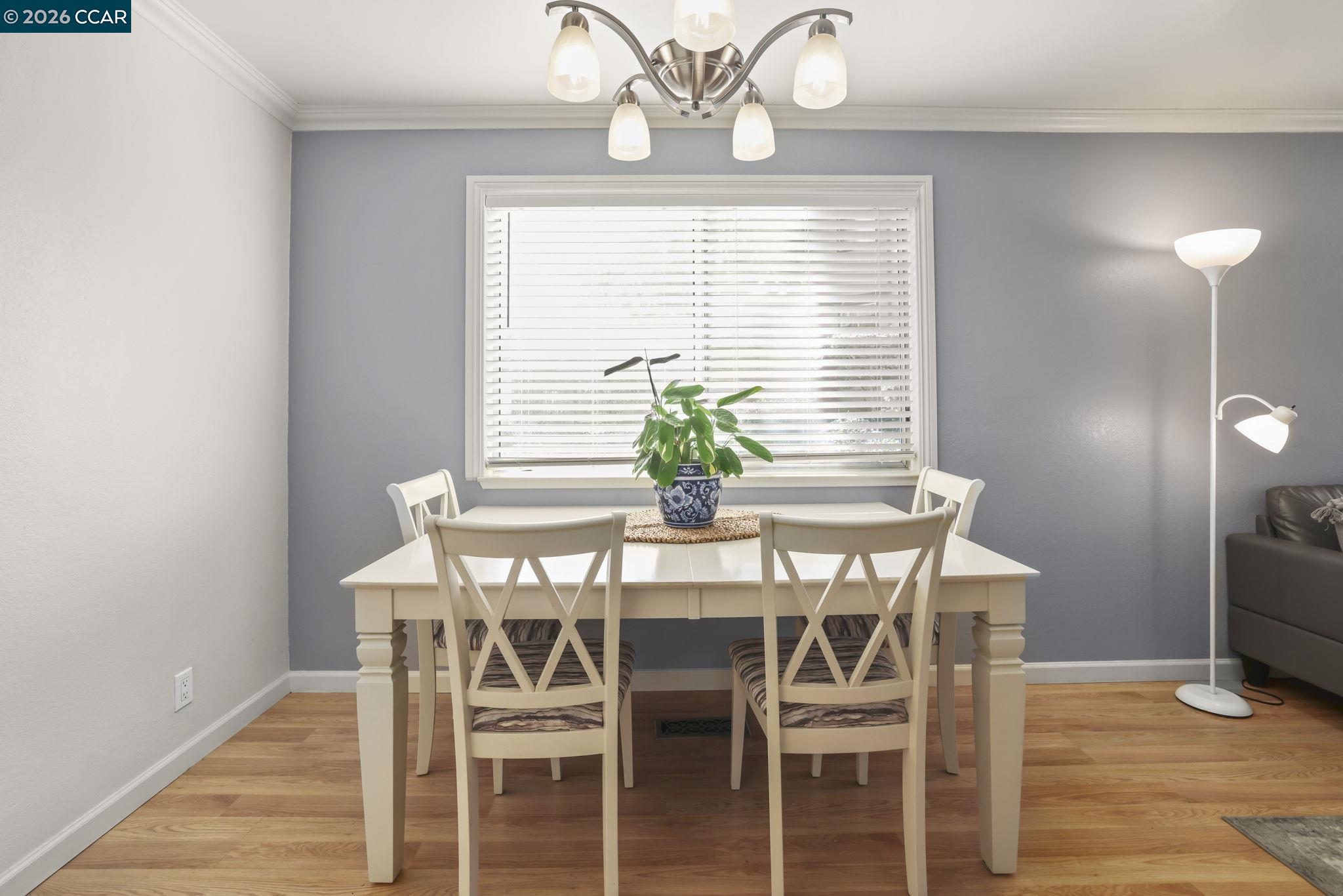 641 Chadwick Lane Bay Point, CA 94565 - Photo 10 of 20 a view of a dining room with furniture window and wooden floor