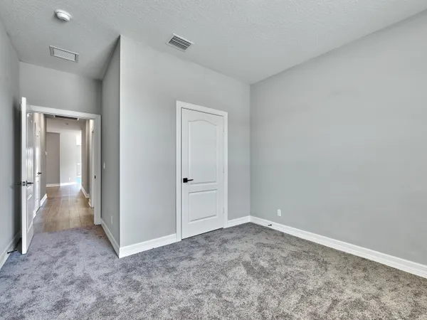 a kitchen with a dining table and chairs