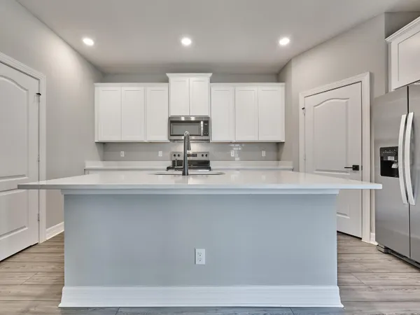 a bedroom with furniture and window