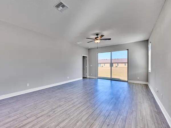 an aerial view of residential building with ocean view