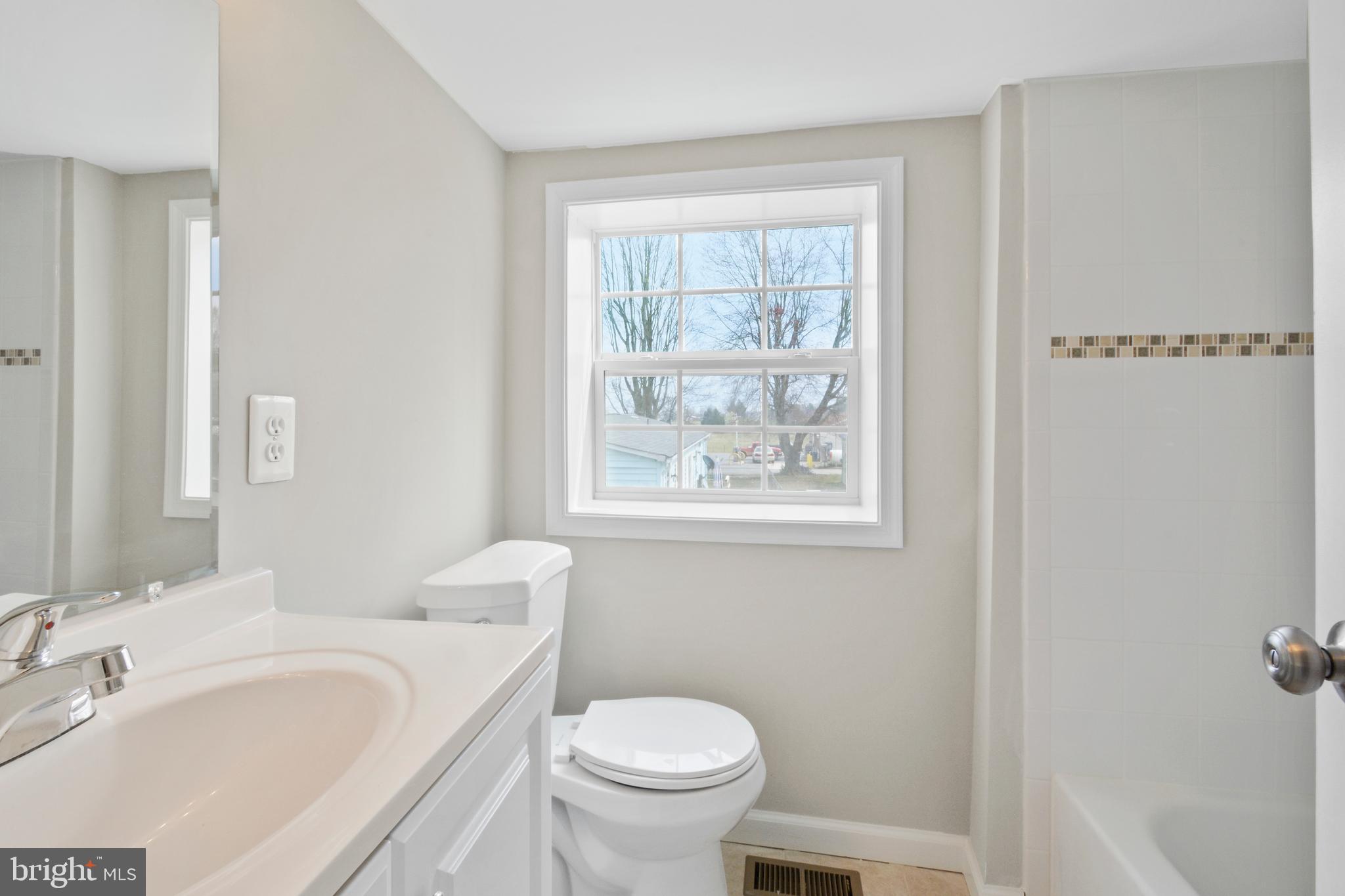 2986 Partlow Road Partlow, VA 22534 - Photo 20 of 36 a bathroom with a sink and a toilet