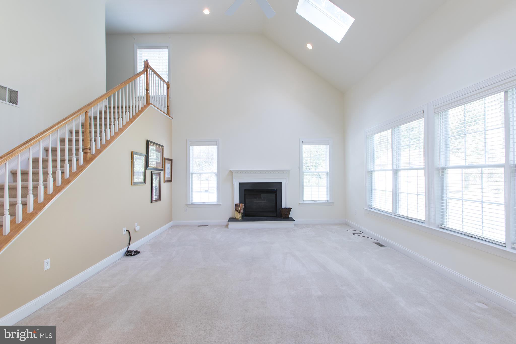 2222 Williams Church Road Hellertown, PA 18055 - Photo 14 of 28 Family room w/cathedral ceiling, back staircase