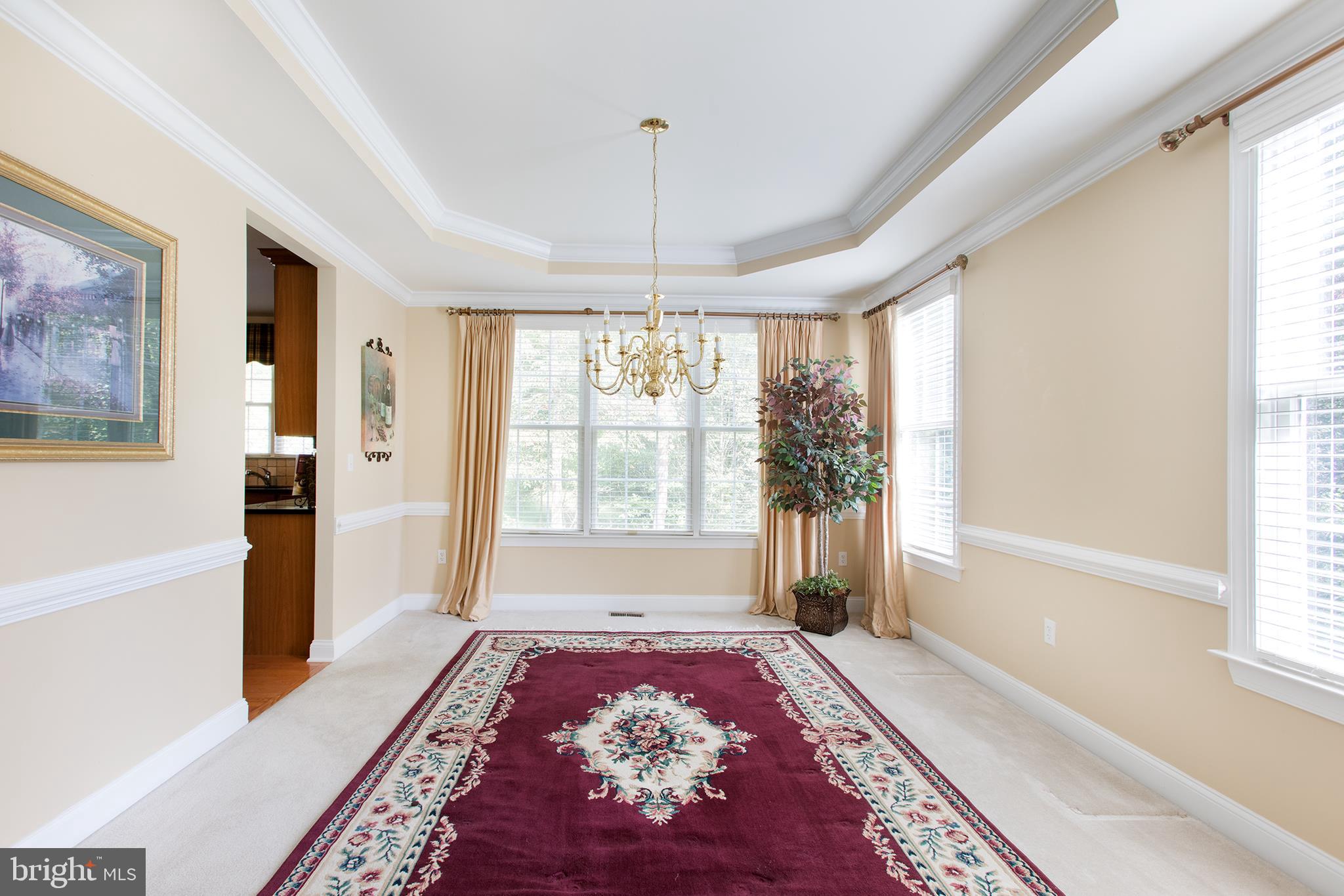 2222 Williams Church Road Hellertown, PA 18055 - Photo 8 of 28 Formal dining room w/tray ceiling, chair railing,