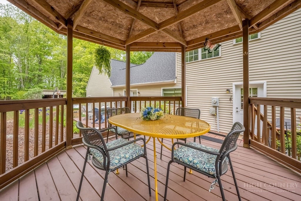 970 Vox Road Sparta, NC 28675 - Photo 13 of 50 a view of a chairs and table in the balcony