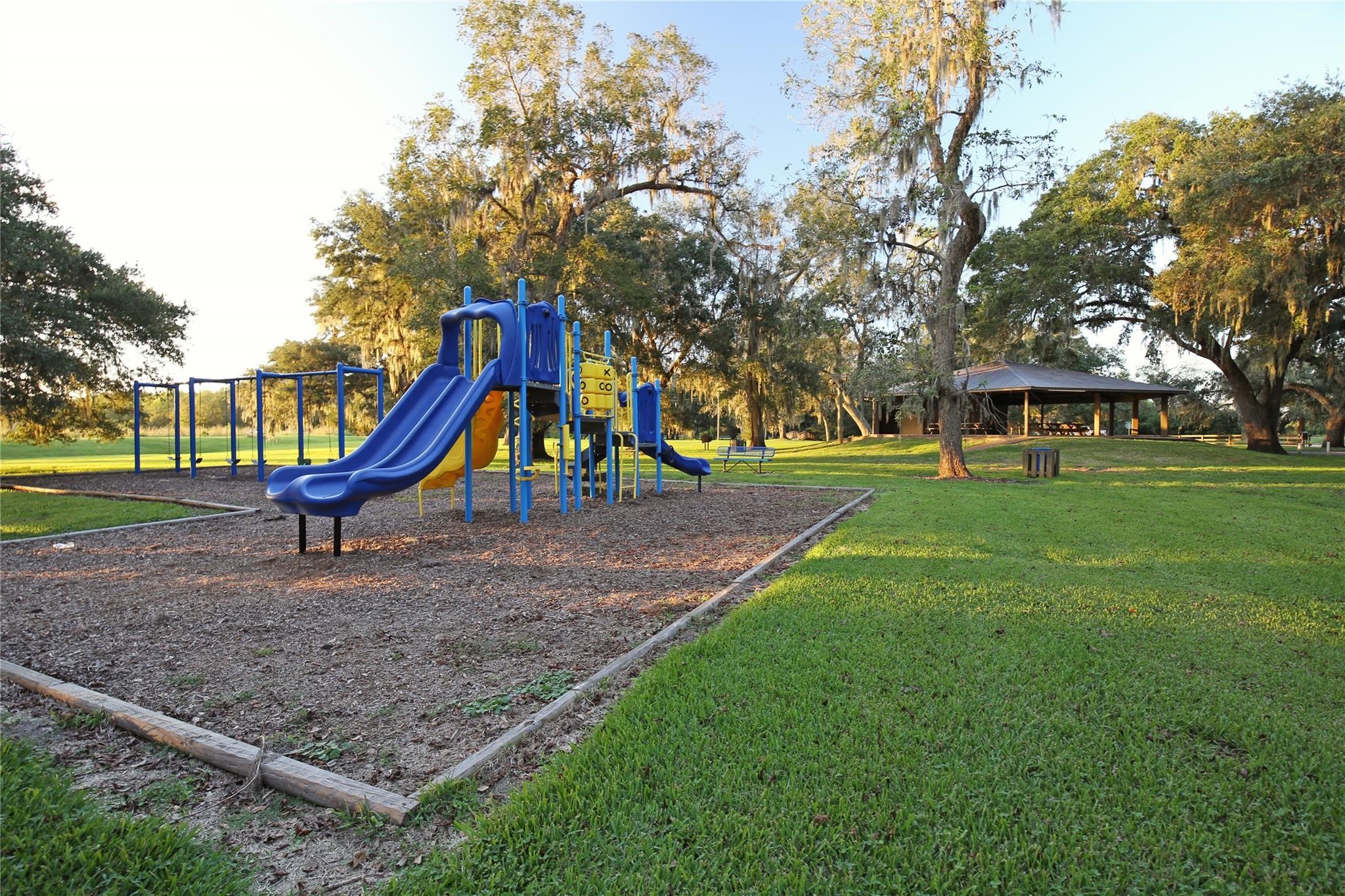 248 Middle Bayou Trail Angleton, TX 77515 - Photo 16 of 18 a view of a park with large trees