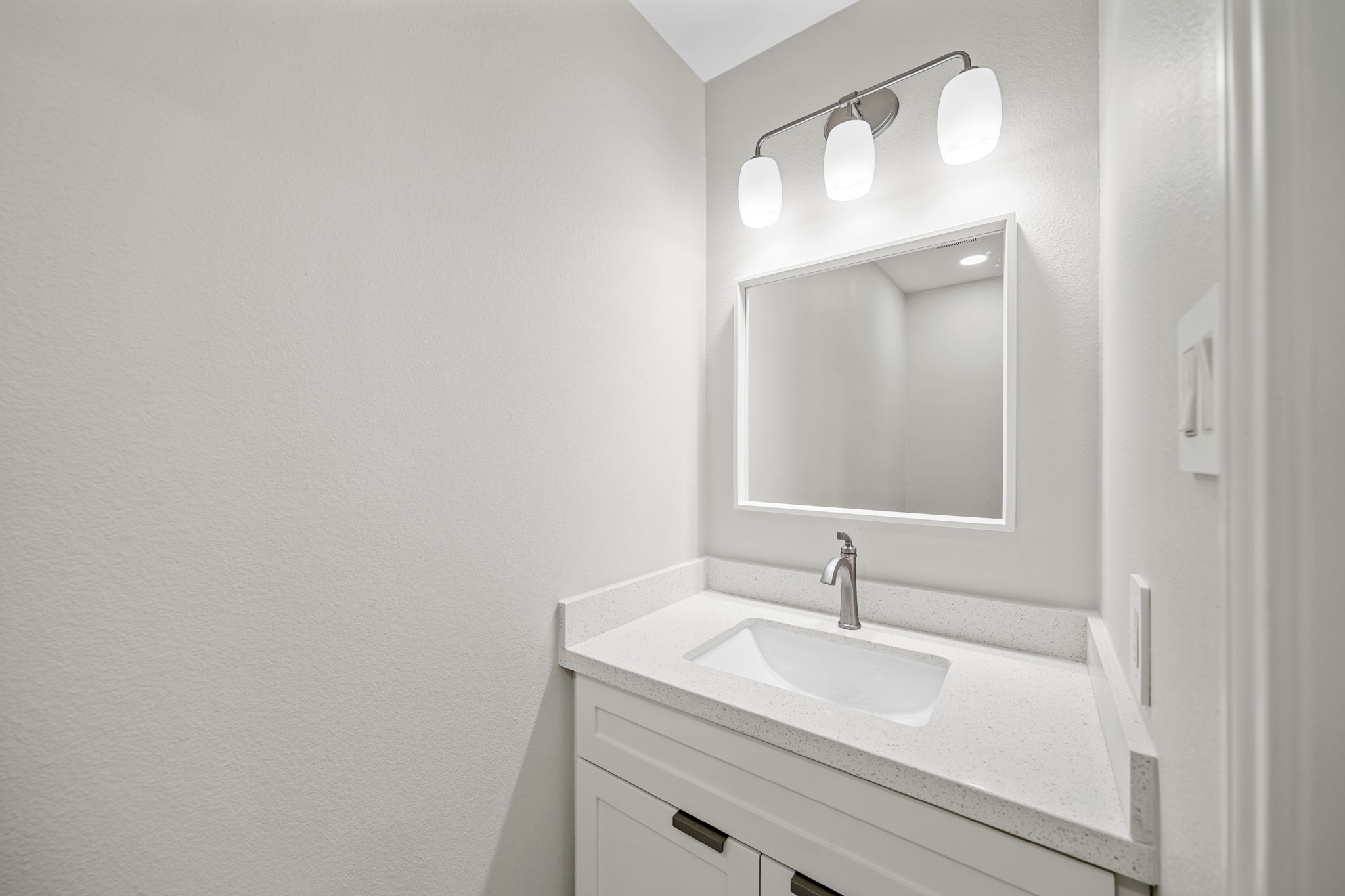 2261 Riverside Drive West Columbia, TX 77486 - Photo 21 of 44 Half bath off of laundry room...how convenient right off the garage workshop area!