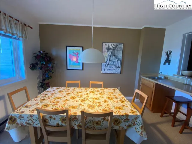 a view of a dining room with furniture