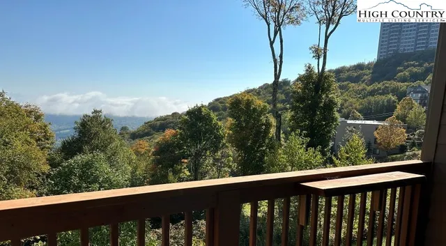 a balcony with an outdoor space