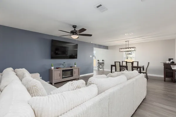 a kitchen with stainless steel appliances a refrigerator sink and stove