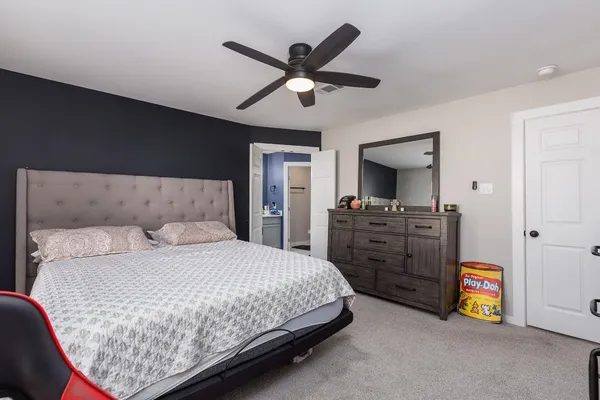 a bathroom with a double vanity sink mirror and shower
