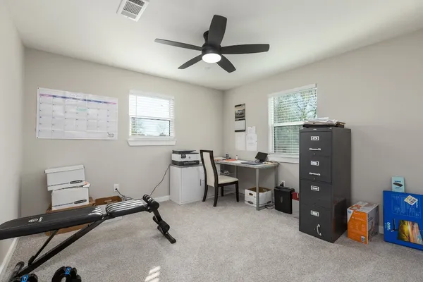 a utility room with sink dryer and washer