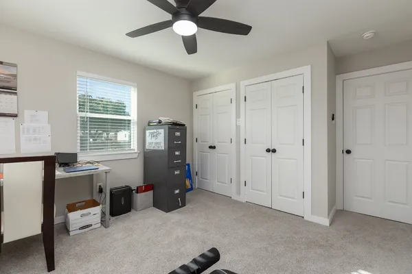an aerial view of residential building and ocean