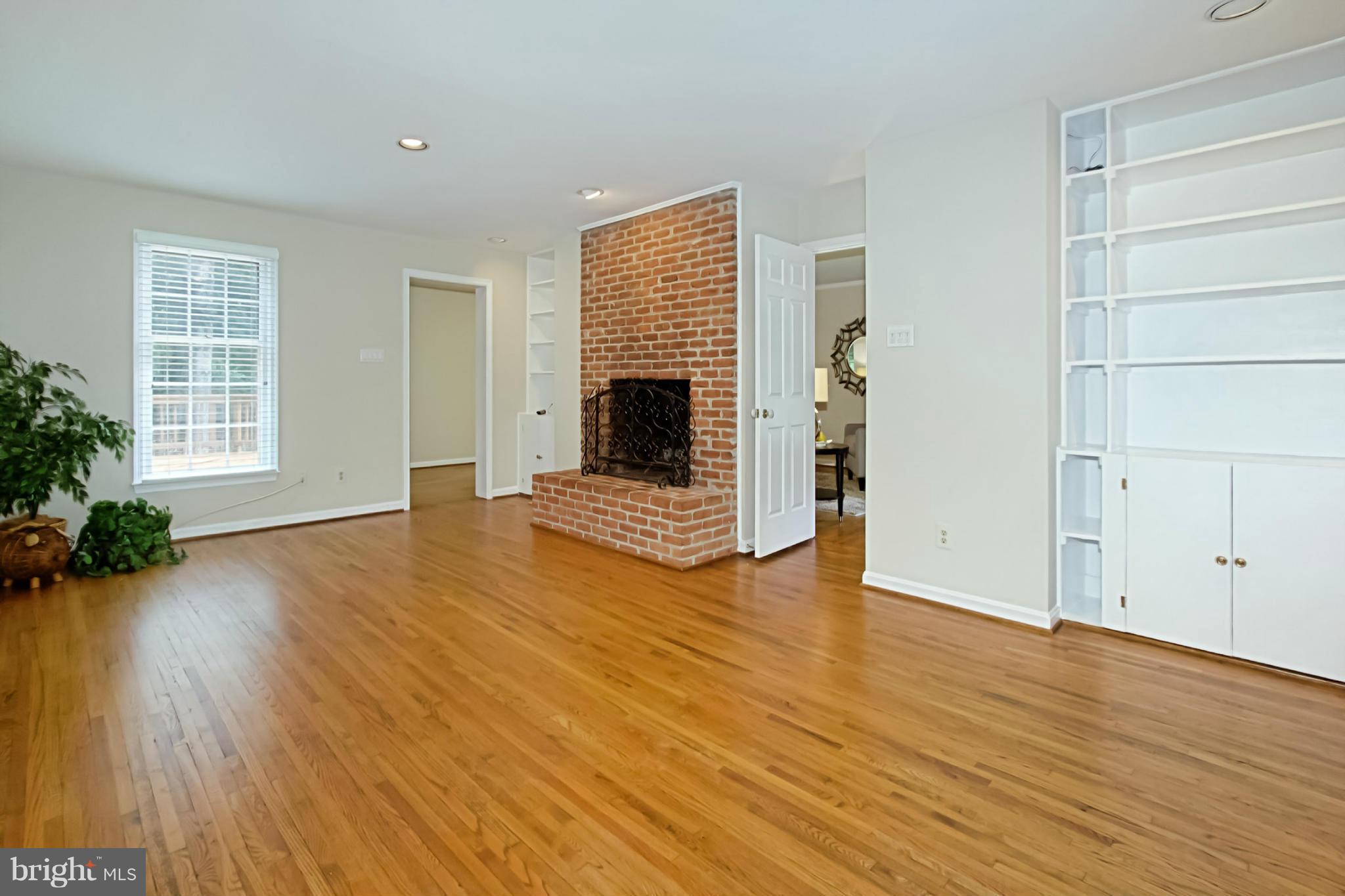 435 Utterback Store Road Great Falls, VA 22066 - Photo 13 of 30 Family Rm with fireplace and built-ins