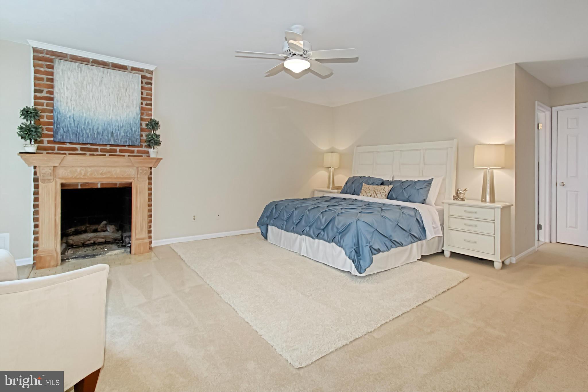 435 Utterback Store Road Great Falls, VA 22066 - Photo 16 of 30 Gas fireplace in master