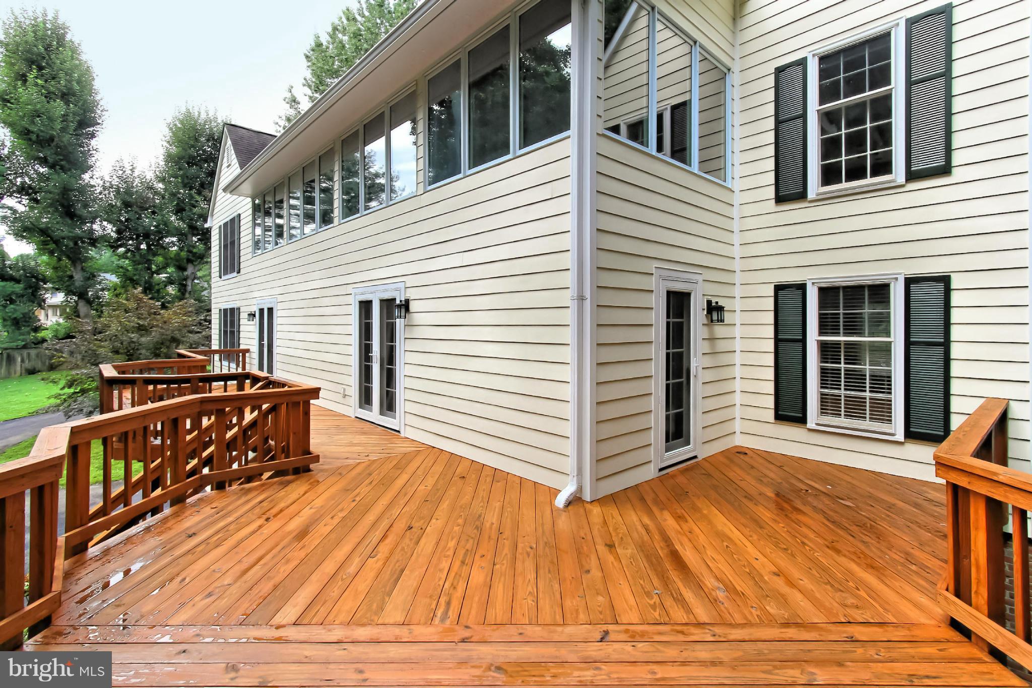 435 Utterback Store Road Great Falls, VA 22066 - Photo 25 of 30 Extensive deck across the back of the house