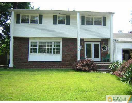 7 Bodnarik Road Edison, NJ 08837 - Photo 1 of 6 a house view with a garden space