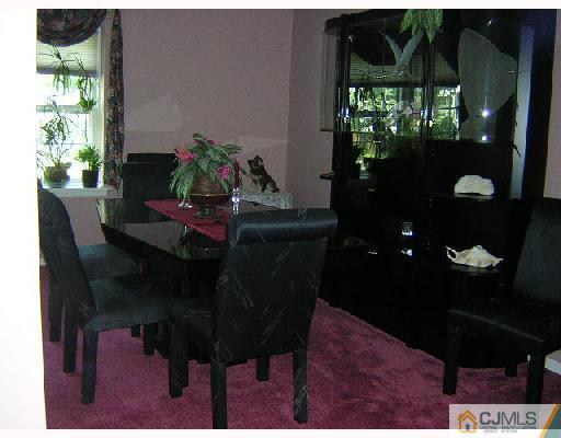 7 Bodnarik Road Edison, NJ 08837 - Photo 4 of 6 a dining room with furniture and window