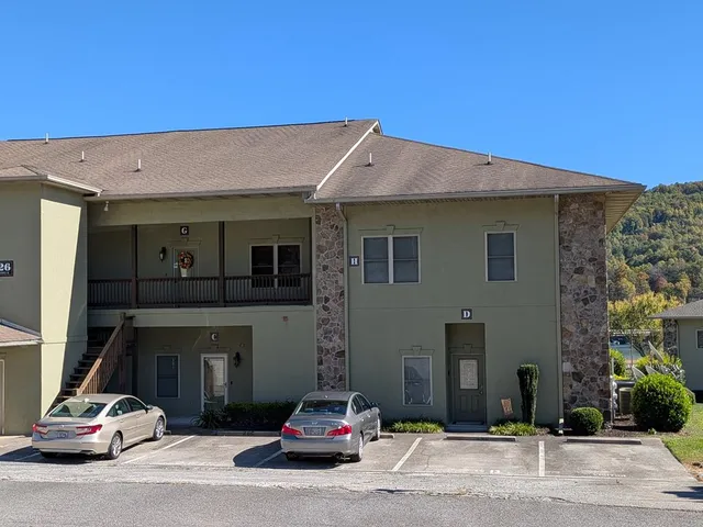 a car parked in front of a house