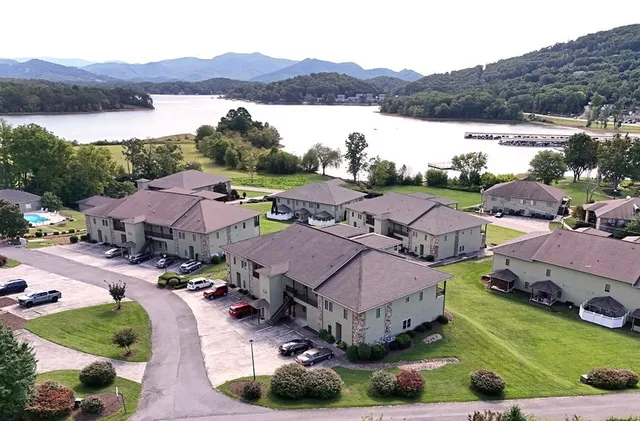 a view of houses with lake and mountain view