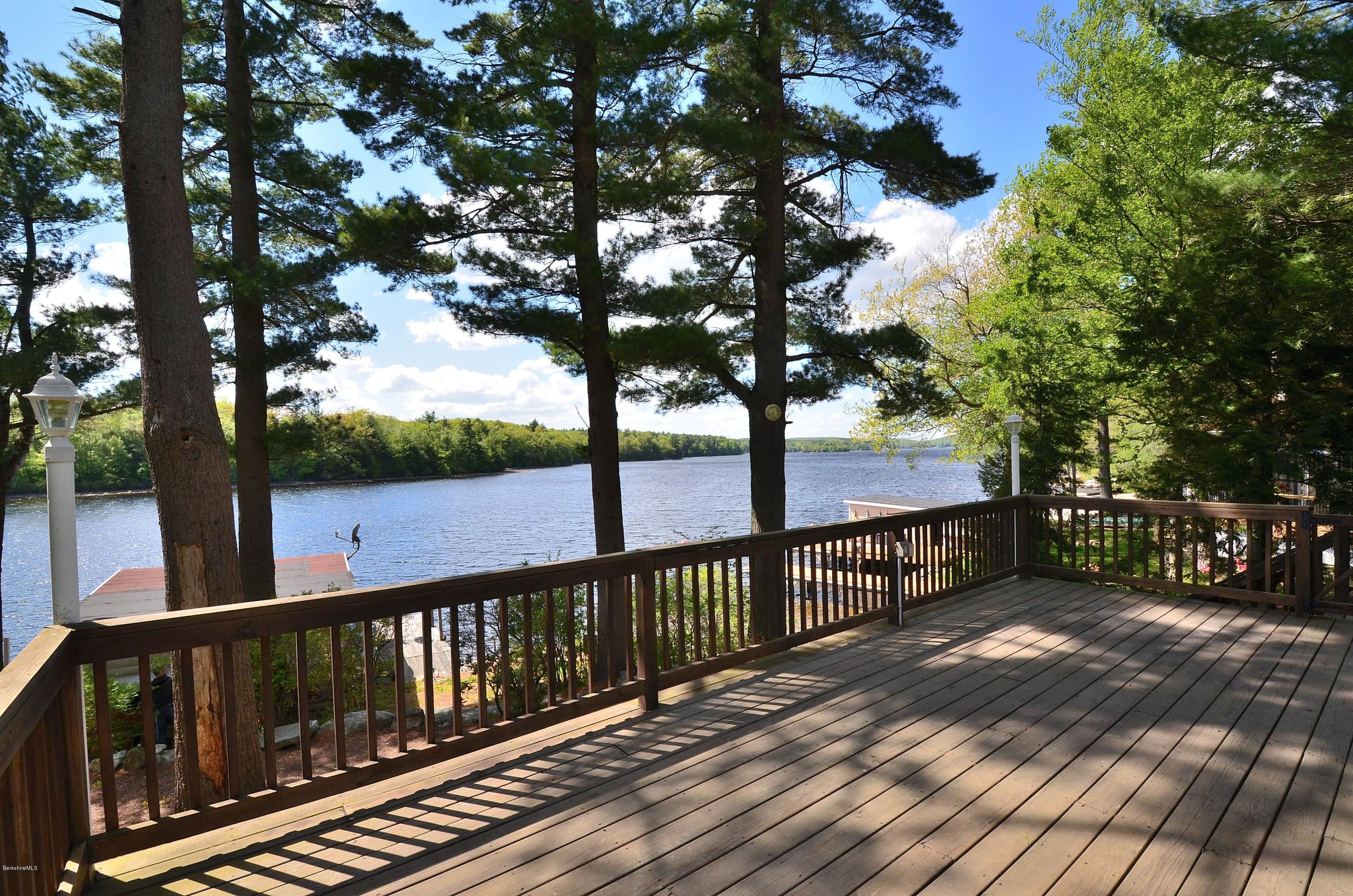 28 Ona Road Tolland, MA 01034 - Photo 2 of 31 a view of balcony with wooden floor and fence