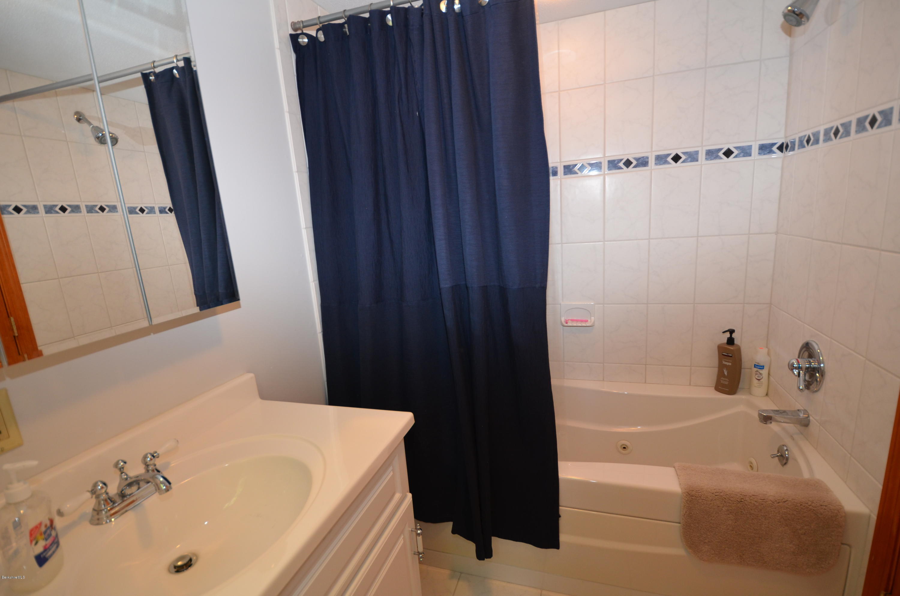 28 Ona Road Tolland, MA 01034 - Photo 12 of 31 a bathroom with a bathtub and shower
