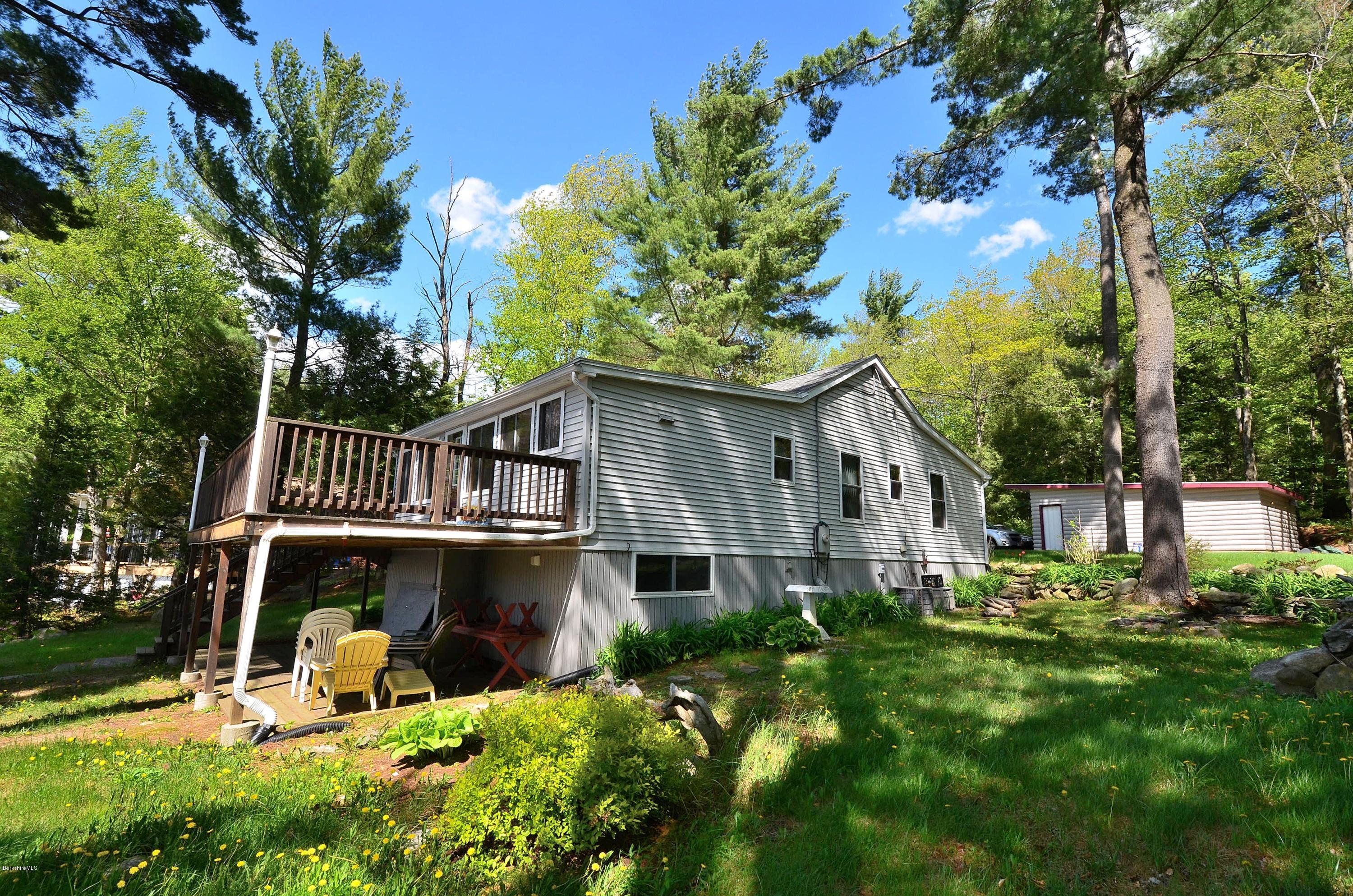 28 Ona Road Tolland, MA 01034 - Photo 27 of 31 a front view of a house with garden