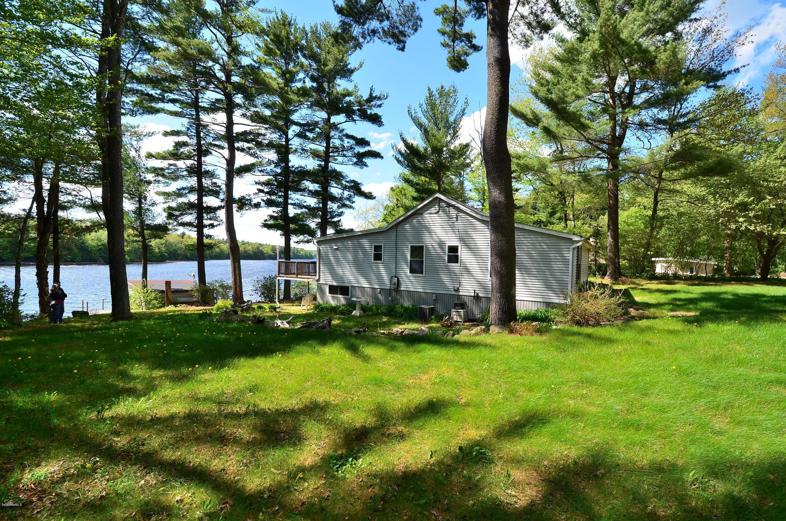 28 Ona Road Tolland, MA 01034 - Photo 28 of 31 a front view of a house with garden