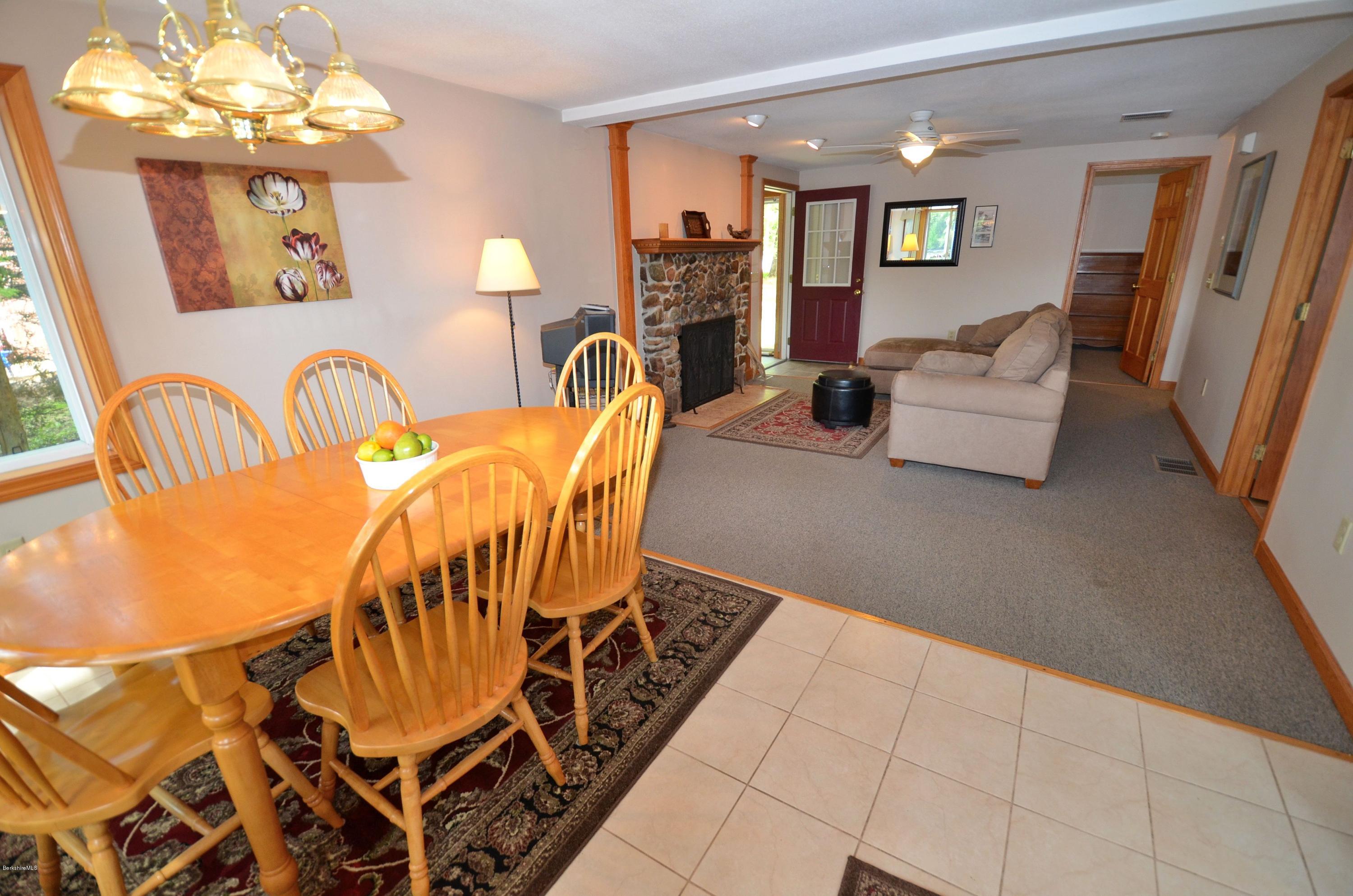 28 Ona Road Tolland, MA 01034 - Photo 8 of 31 a dining room with furniture and chandelier