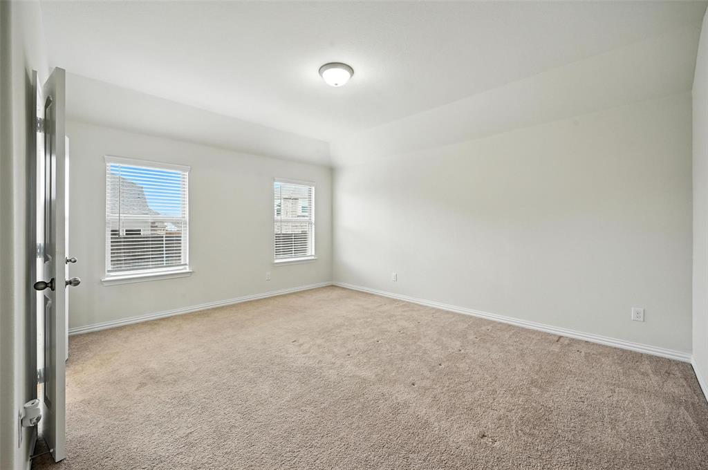 5 Pheasant Run Sanger, TX 76266 - Photo 22 of 27 Empty room with light colored carpet and baseboards
