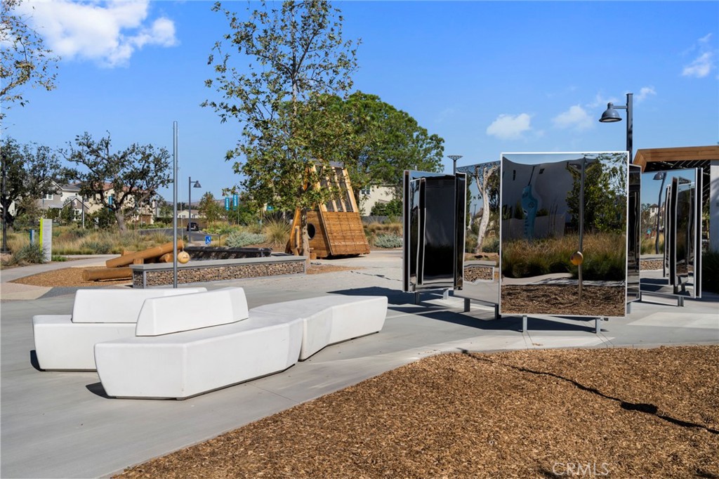 126 Scale Irvine, CA 92618 - Photo 44 of 75 a swimming pool with outdoor seating and yard