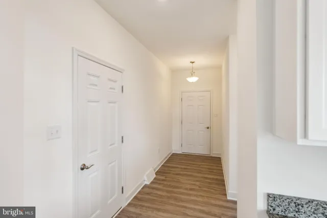 a view of a bathroom from the hallway