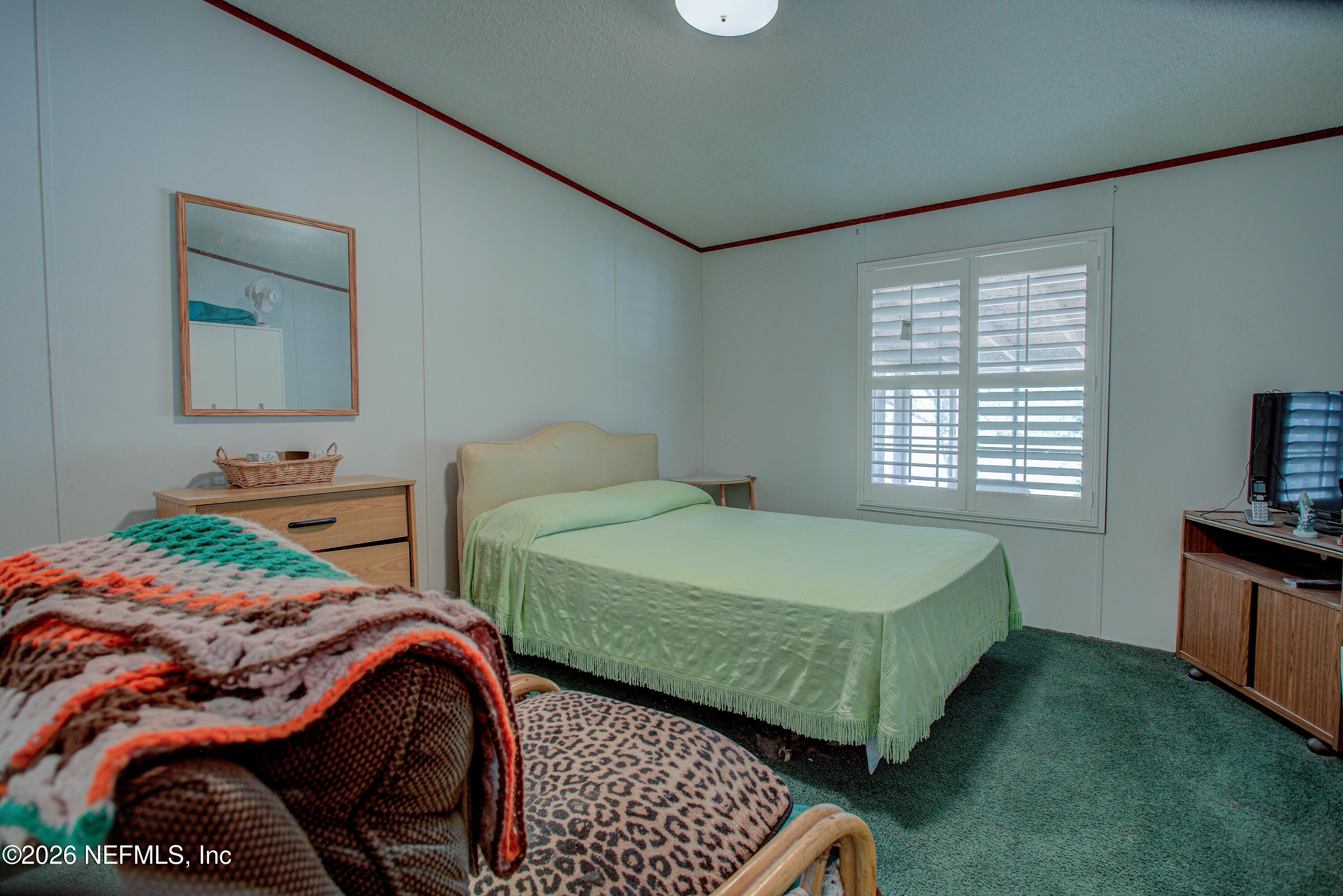 28050 Roundup Place Hilliard, FL 32046 - Photo 30 of 43 20260402-28050_Roundup_Pl-58