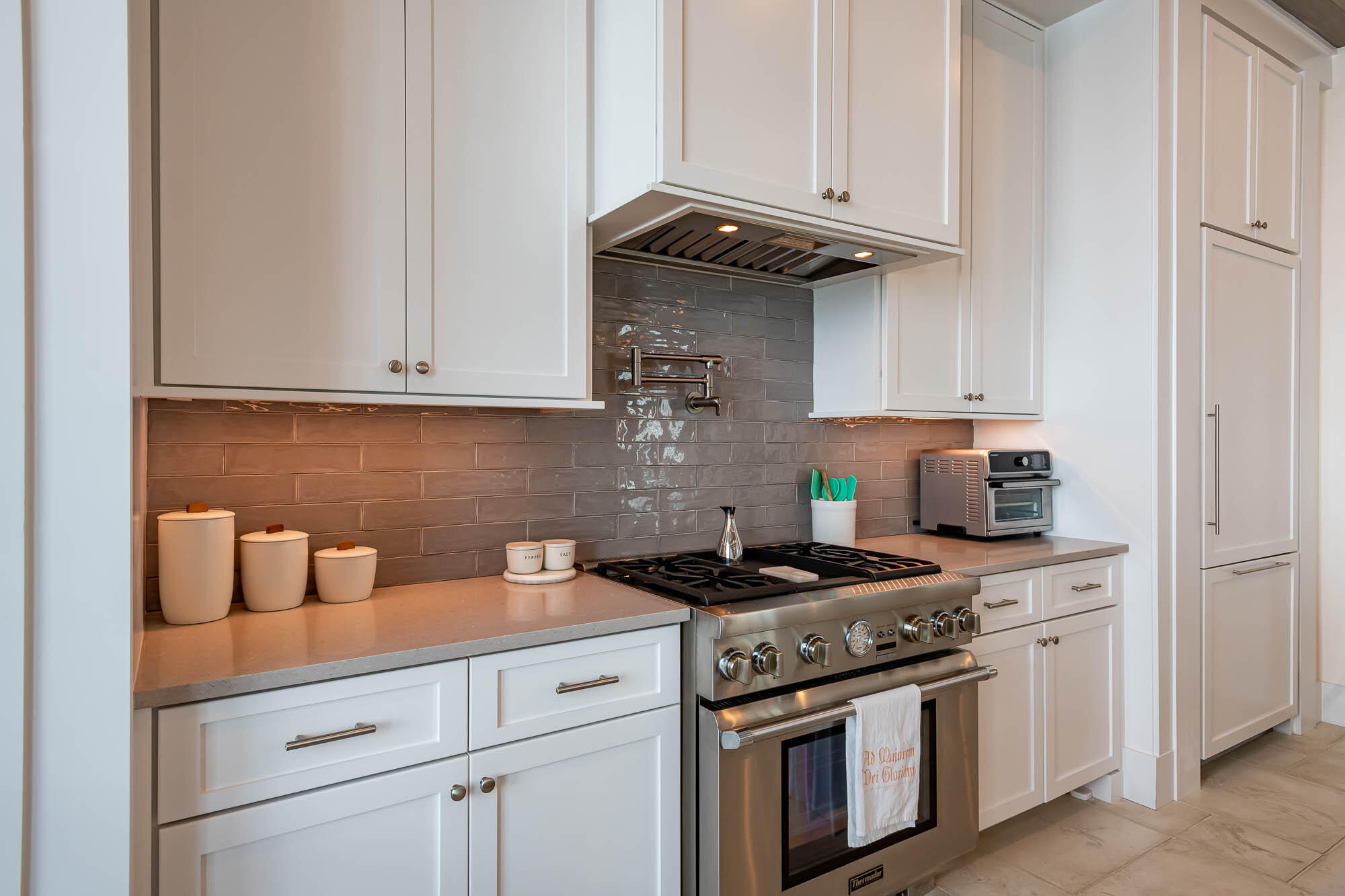 24 Sea Star Ct Inlet Beach Inlet Beach, FL 32461 - Photo 15 of 63 a kitchen with stainless steel appliances granite countertop white cabinets and a stove top oven