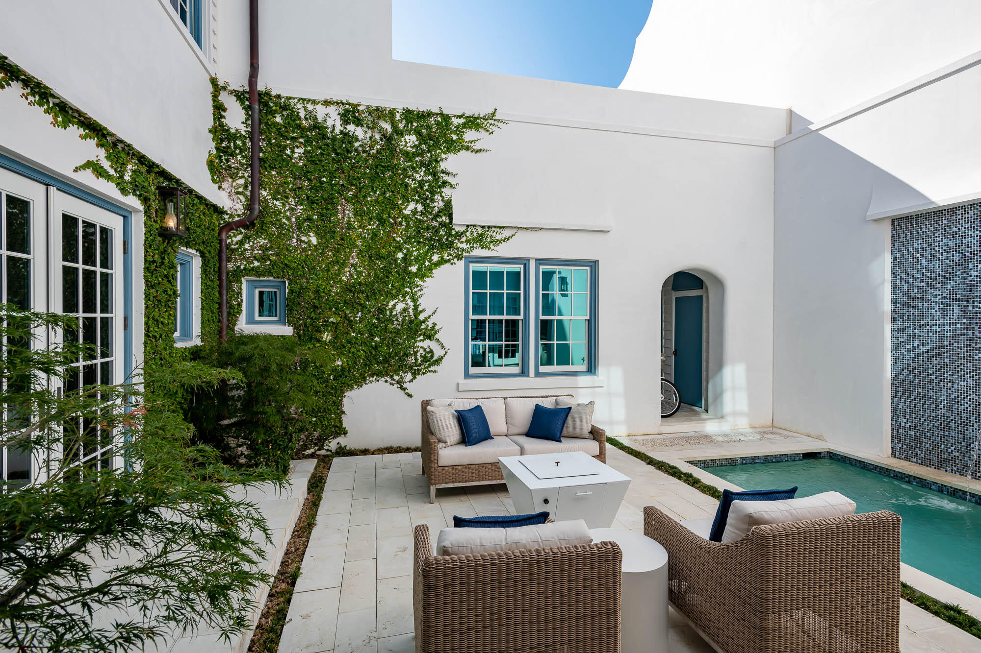 24 Sea Star Ct Inlet Beach Inlet Beach, FL 32461 - Photo 28 of 63 a living room with patio furniture and potted plants