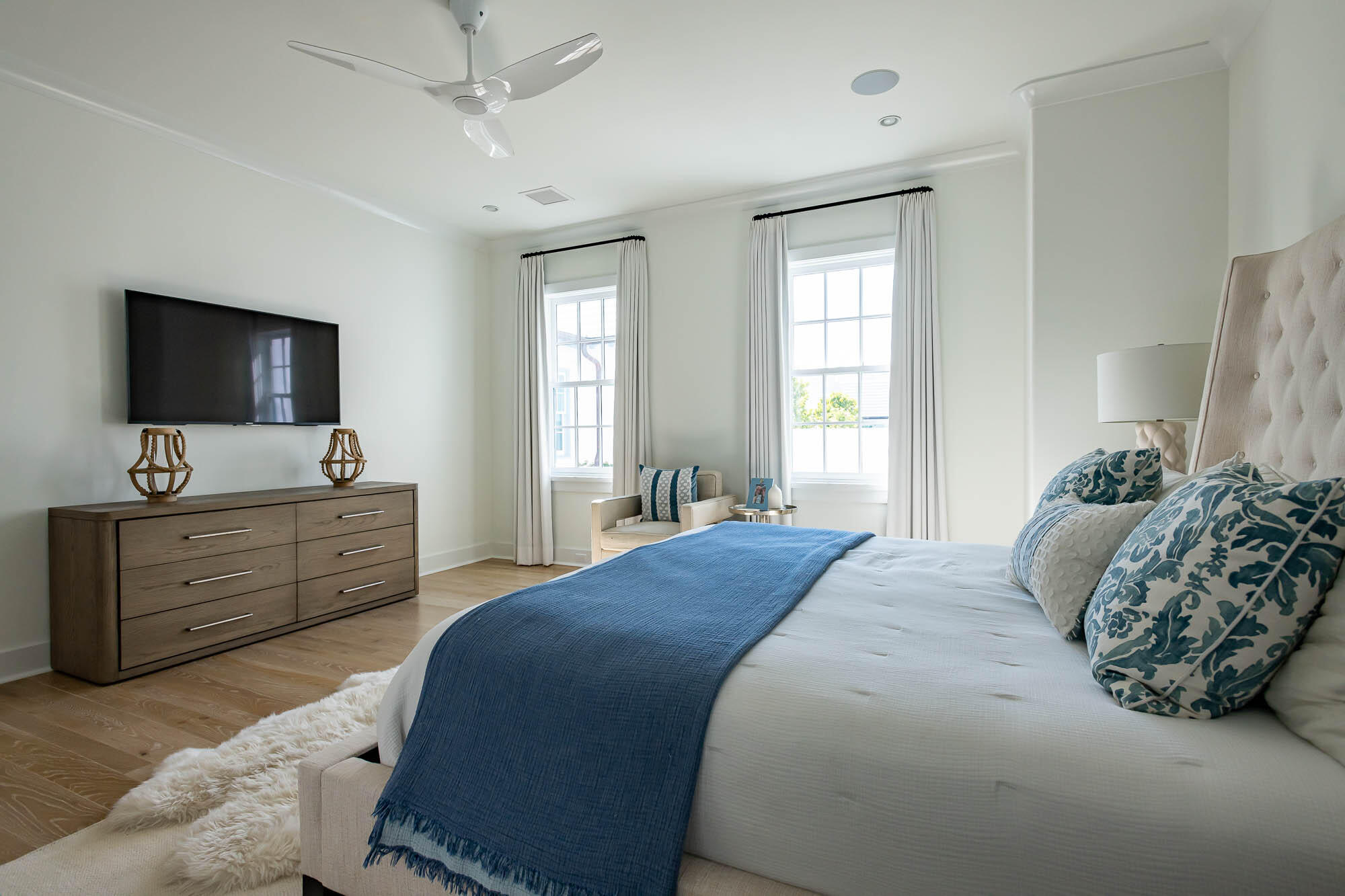 24 Sea Star Ct Inlet Beach Inlet Beach, FL 32461 - Photo 40 of 63 a bedroom with a large bed and a flat tv screen on dresser