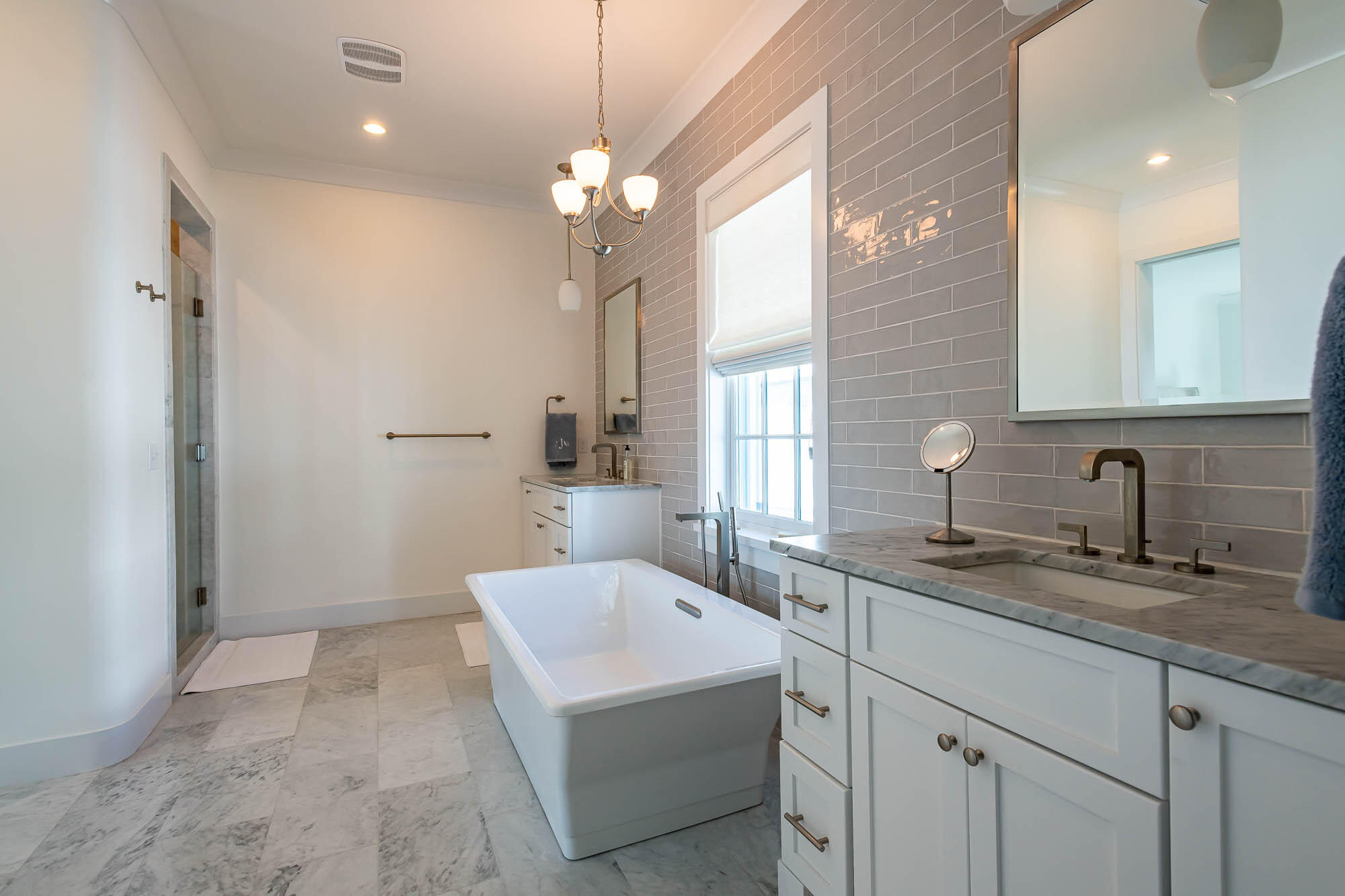 24 Sea Star Ct Inlet Beach Inlet Beach, FL 32461 - Photo 41 of 63 a bathroom with a sink a vanity a mirror and a shower