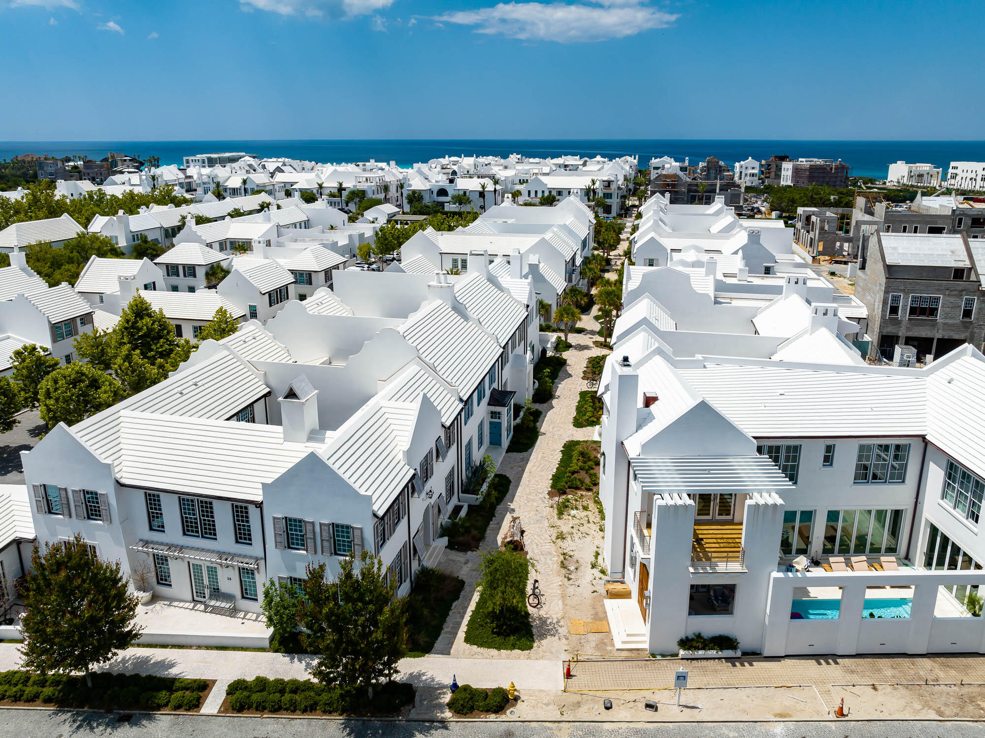 24 Sea Star Ct Inlet Beach Inlet Beach, FL 32461 - Photo 53 of 63 a view of a white building among the street with houses