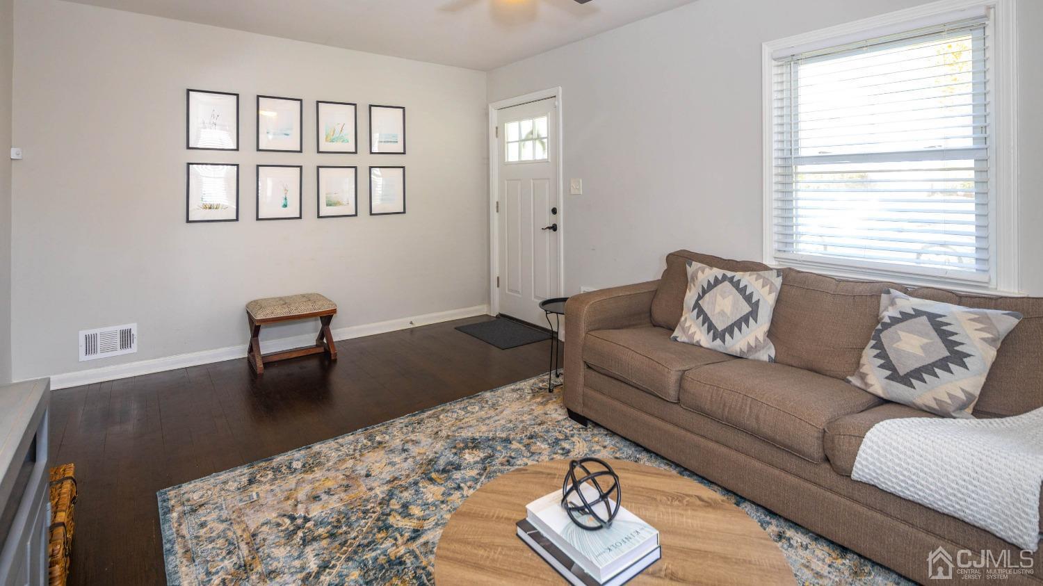 48 Coldevin Road Clark, NJ 07066 - Photo 7 of 38 a living room with furniture and a couch